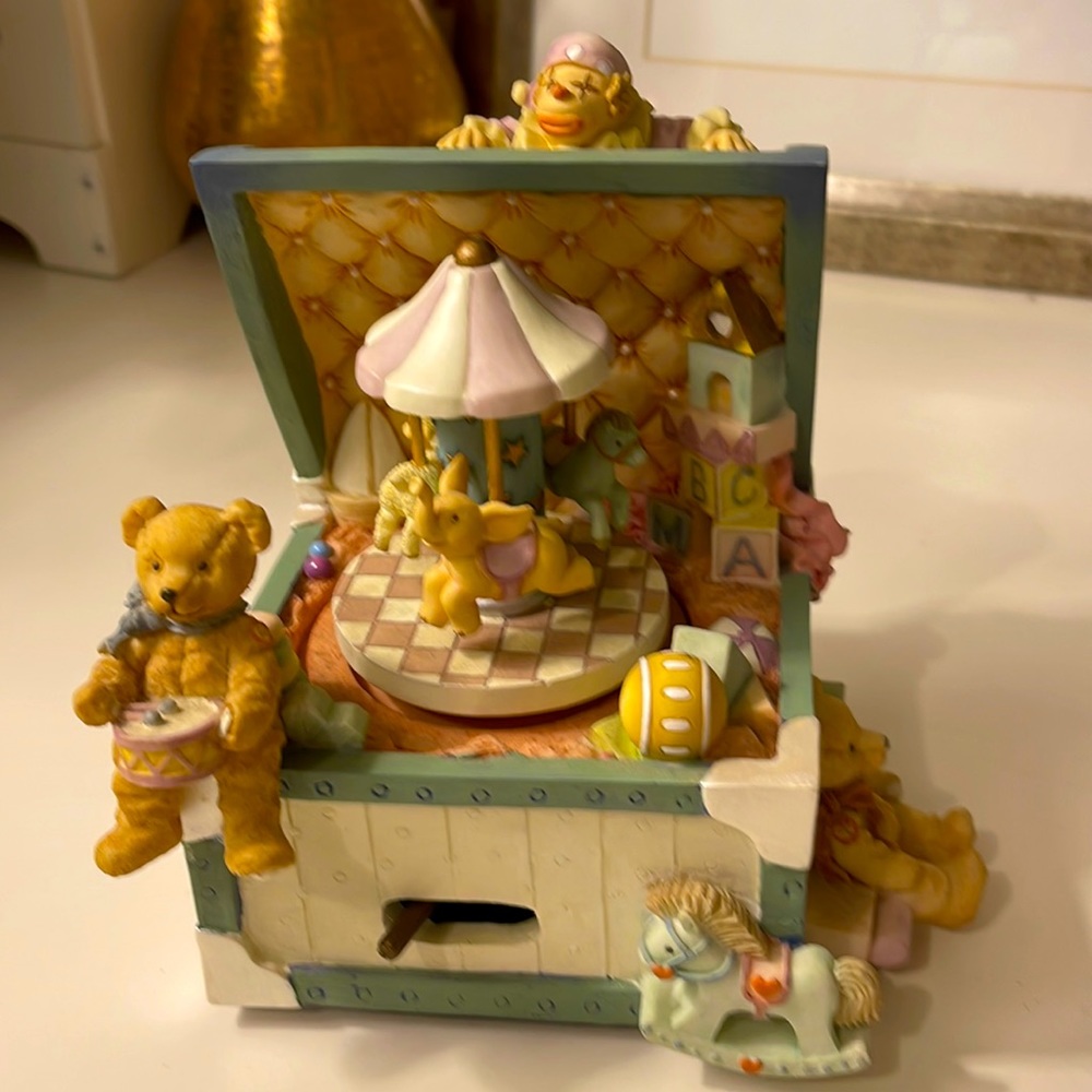 Cute bear and his friends music box.